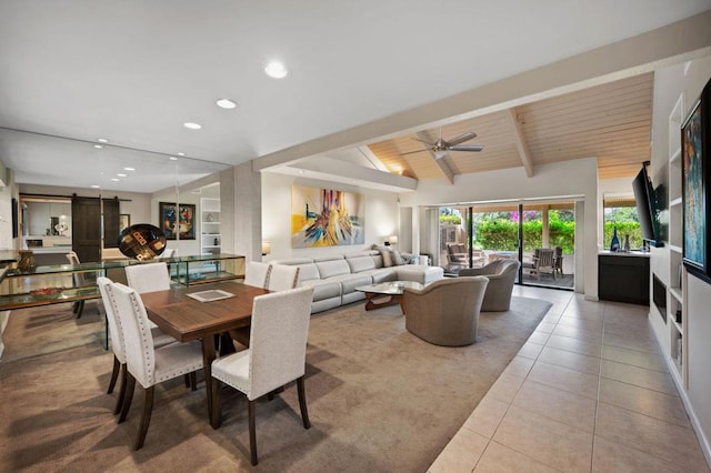 tiled dining space featuring a barn door, ceiling fan, wooden ceiling, and vaulted ceiling with beams