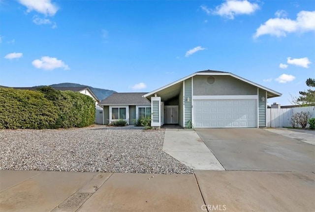 ranch-style home with a garage