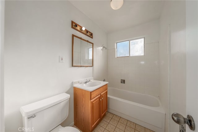 full bathroom featuring vanity, toilet, and tiled shower / bath combo