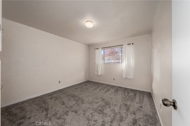 unfurnished room featuring carpet flooring