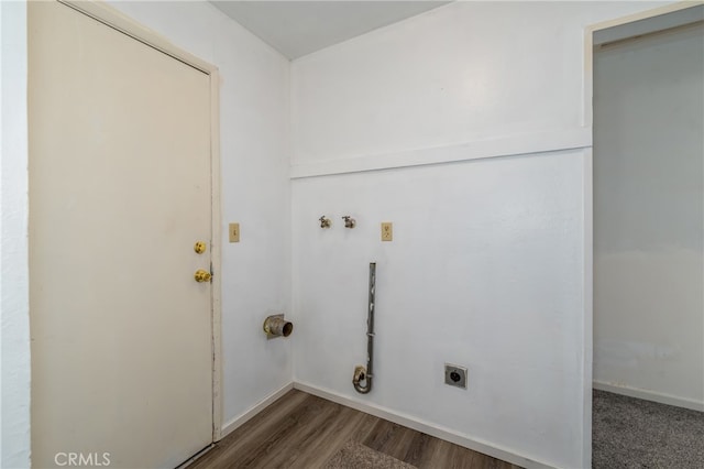 laundry room featuring dark wood-type flooring and hookup for an electric dryer