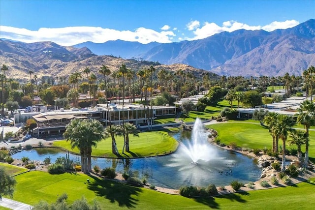 view of home's community featuring a water and mountain view