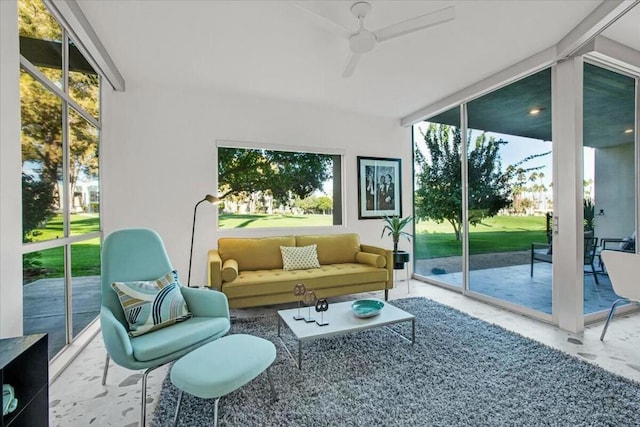 sunroom with ceiling fan