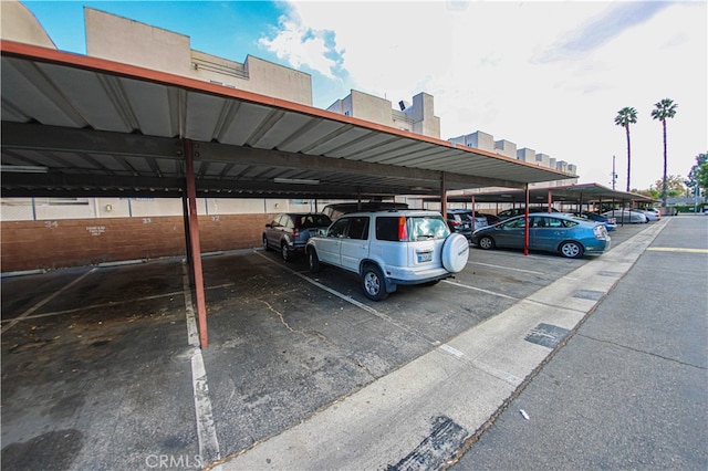 view of car parking featuring a carport