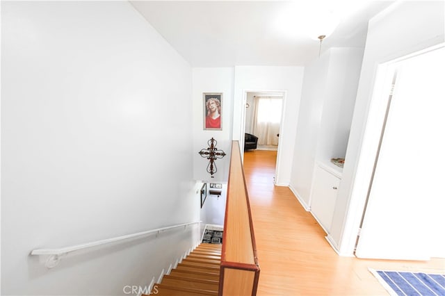 hallway with light wood-type flooring