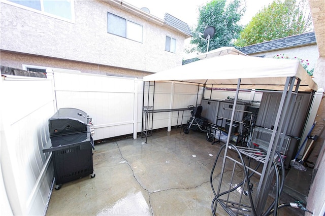 view of patio with a grill