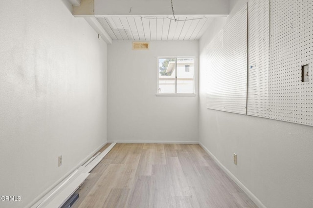 empty room with light wood-type flooring