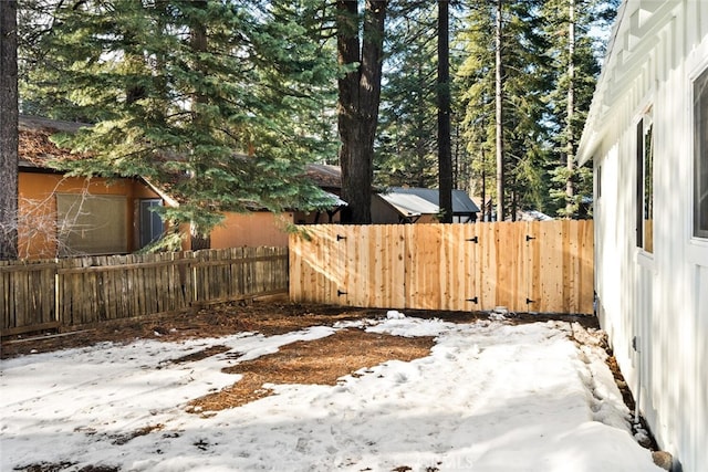 view of yard covered in snow