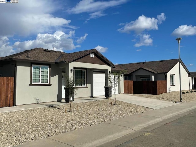 single story home with a garage