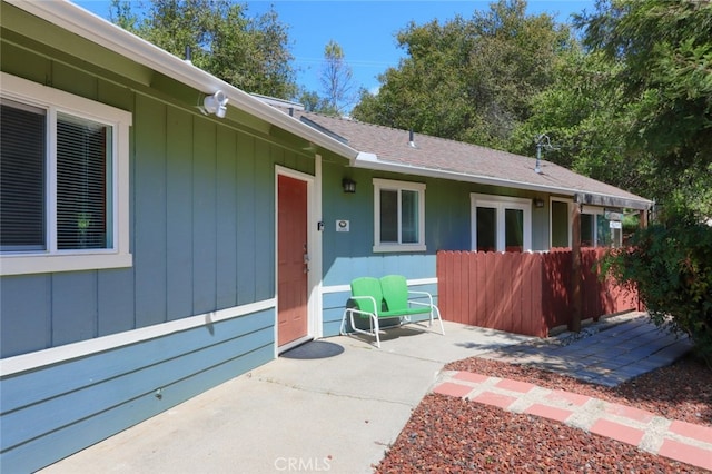 property entrance with a patio