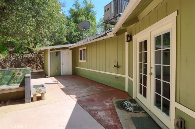 view of patio / terrace featuring cooling unit and french doors