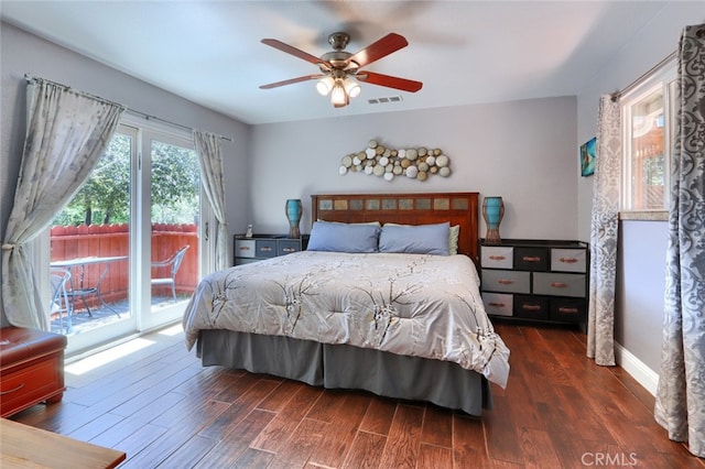 bedroom with ceiling fan, dark wood-type flooring, and access to outside