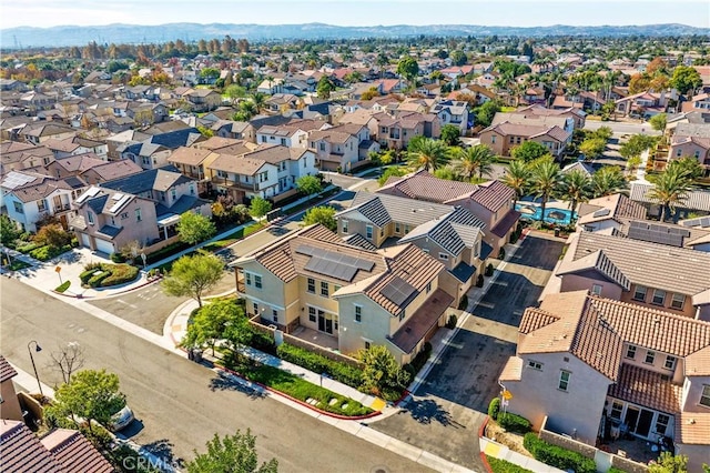 drone / aerial view featuring a mountain view