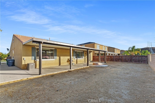 back of property featuring a patio area