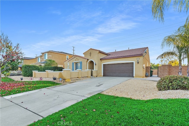 view of front of home with a front lawn and a garage