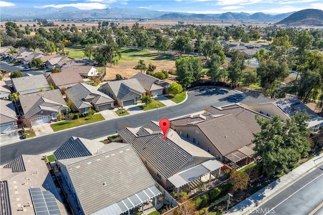 drone / aerial view featuring a mountain view