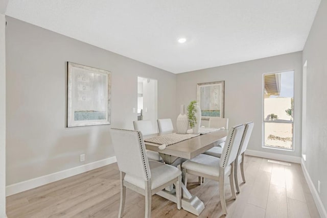 dining room featuring light wood-type flooring