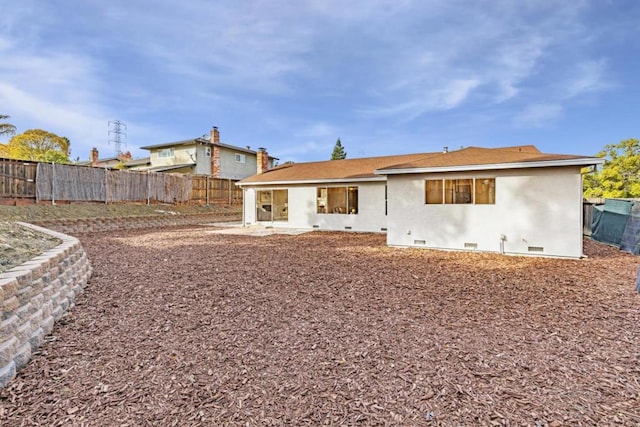 back of house featuring a patio