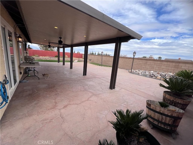 view of patio / terrace with ceiling fan