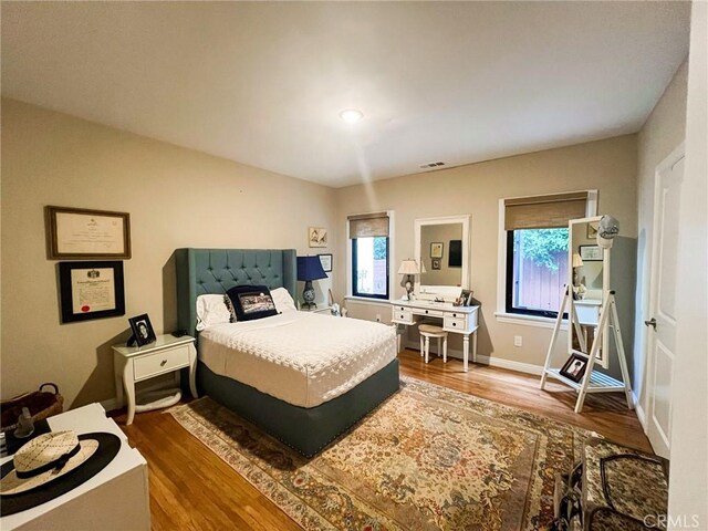 bedroom featuring hardwood / wood-style floors