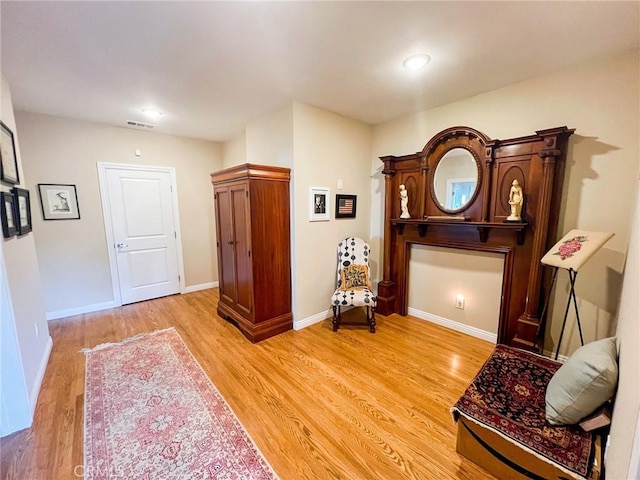 living area with light wood-type flooring