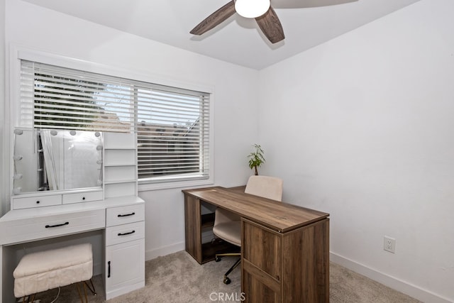 office area with light carpet and ceiling fan