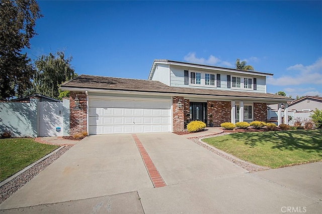 front facade with a garage and a front lawn