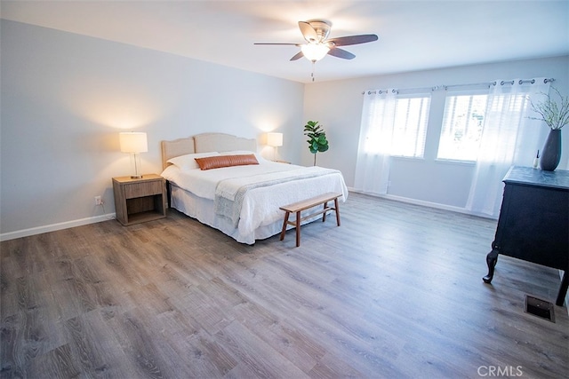 bedroom featuring ceiling fan and wood-type flooring