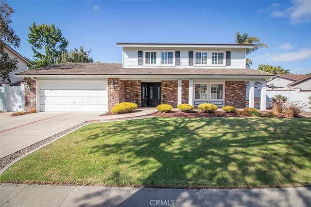 front of property with a garage and a front lawn