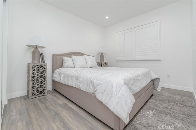 bedroom with wood-type flooring