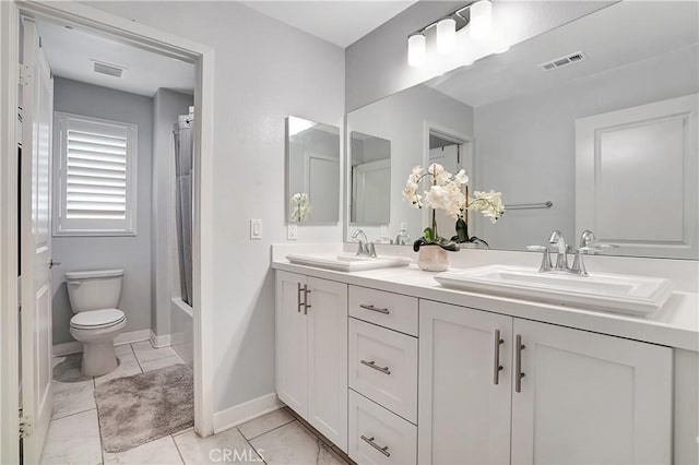 full bathroom featuring vanity, shower / bath combination with curtain, and toilet