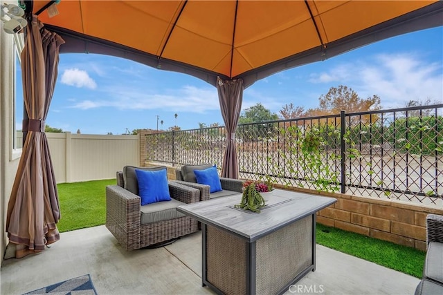 view of patio / terrace featuring a gazebo and an outdoor hangout area