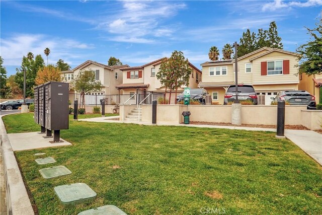 view of yard with mail boxes