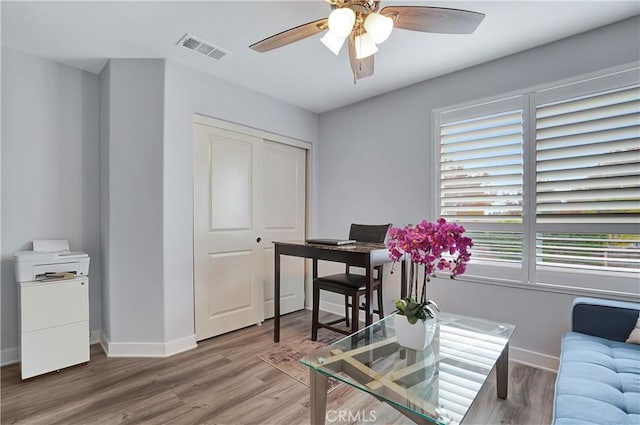 office area featuring hardwood / wood-style floors and ceiling fan