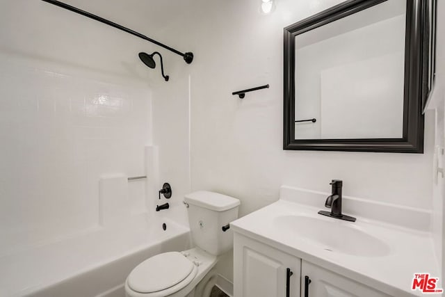 full bathroom featuring vanity,  shower combination, and toilet