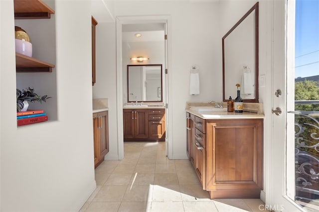 bathroom featuring tile patterned floors and vanity