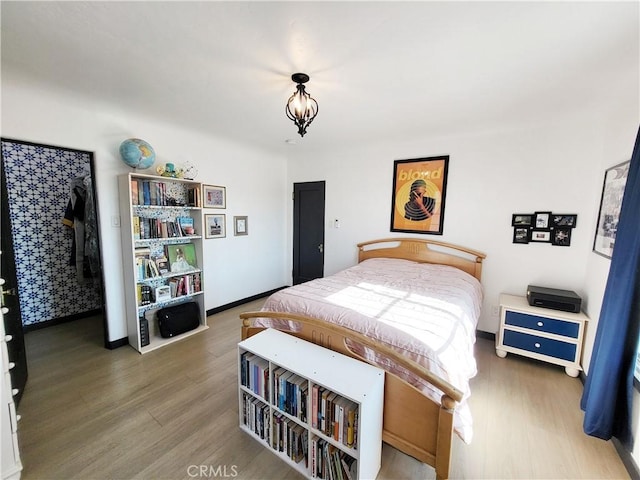 bedroom featuring hardwood / wood-style floors