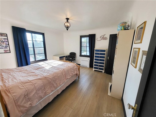 bedroom featuring hardwood / wood-style flooring