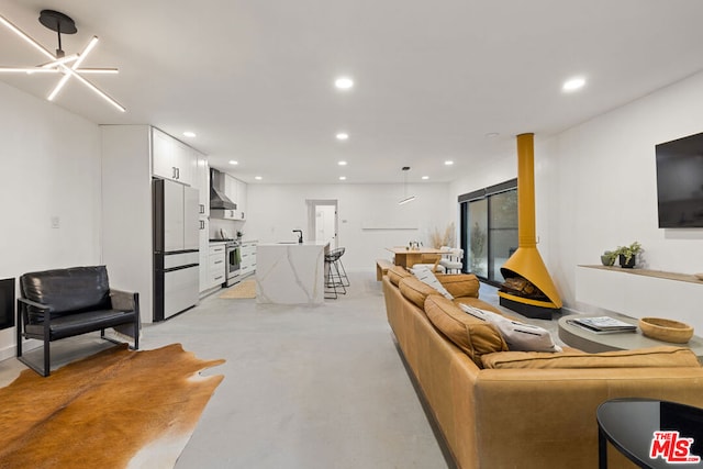 living room featuring an inviting chandelier