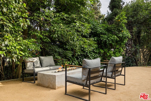 view of patio with a fire pit