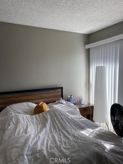 bedroom with a textured ceiling