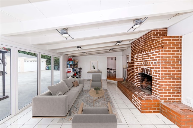 tiled living room featuring lofted ceiling with beams and a fireplace