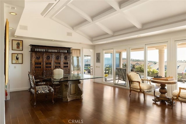 living area featuring vaulted ceiling with beams, a wealth of natural light, and dark wood-type flooring