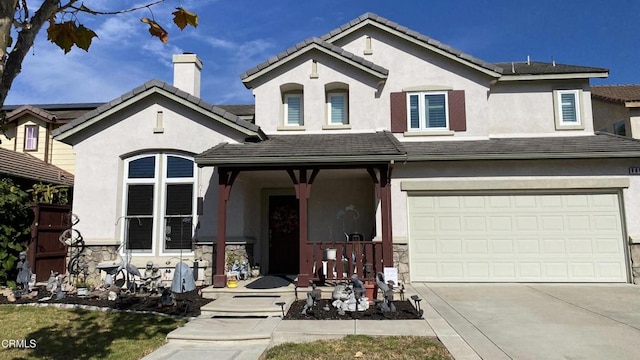 view of front of property featuring a garage