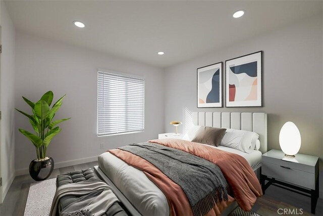 bedroom with wood-type flooring