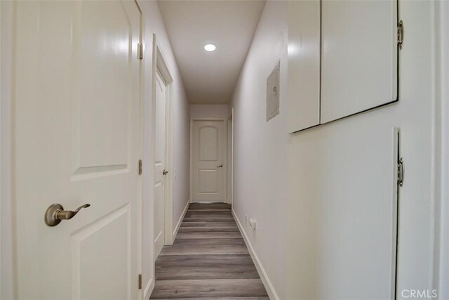 hall with light hardwood / wood-style flooring