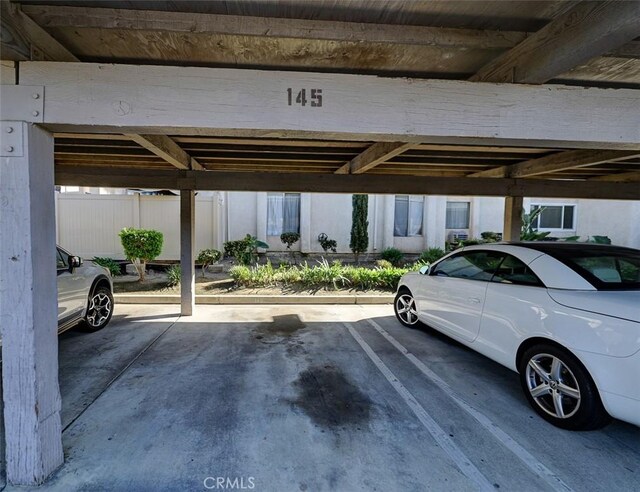 view of car parking with a carport