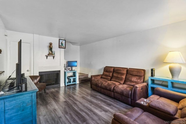 living room featuring dark hardwood / wood-style flooring