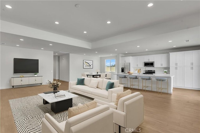 living room featuring light wood-type flooring