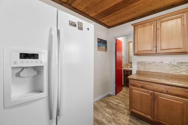 kitchen with wood-type flooring, white refrigerator with ice dispenser, backsplash, and wooden ceiling